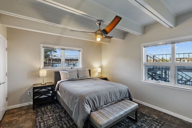 421 Yucca Dr, Kingsland, TX 78639 - bedroom featuring beam ceiling and ceiling fan