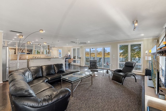 421 Yucca Dr, Kingsland, TX 78639 - living area featuring ornamental molding, recessed lighting, and a ceiling fan