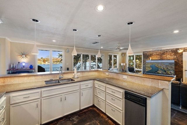 421 Yucca Dr, Kingsland, TX 78639 - kitchen featuring open floor plan, recessed lighting, stone countertops, plenty of natural light, and decorative light fixtures