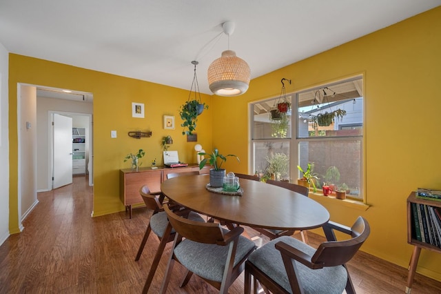 4701 Sylvandale Dr Unit 1, Austin, TX 78745 - dining area with wood finished floors and baseboards