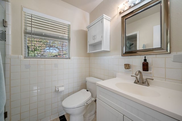 4701 Sylvandale Dr Unit 1, Austin, TX 78745 - bathroom with tile walls, vanity, wainscoting, and a shower