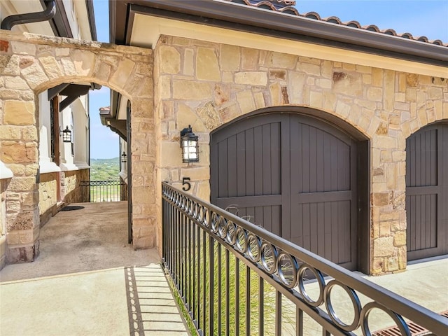 17545 E Reed Parks Rd Unit 5, Jonestown, TX 78645 - view of exterior entry with stone siding