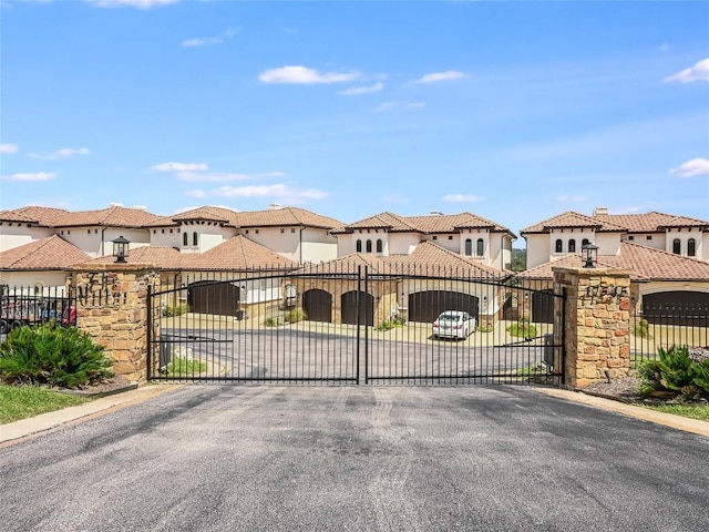 17545 E Reed Parks Rd Unit 5, Jonestown, TX 78645 - gate with a residential view