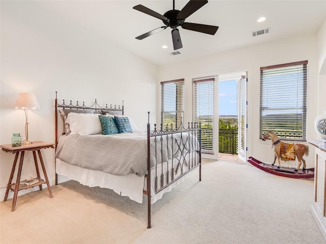 17545 E Reed Parks Rd Unit 5, Jonestown, TX 78645 - bedroom with light colored carpet, access to exterior, recessed lighting, and a ceiling fan
