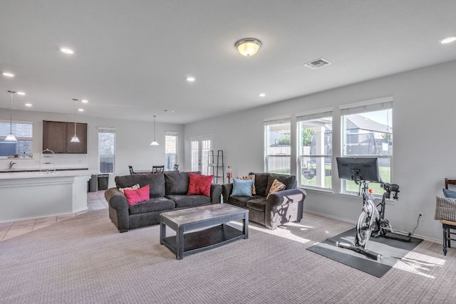 1062 Bowline Dr, Georgetown, TX 78633 - living room with light colored carpet, recessed lighting, and baseboards