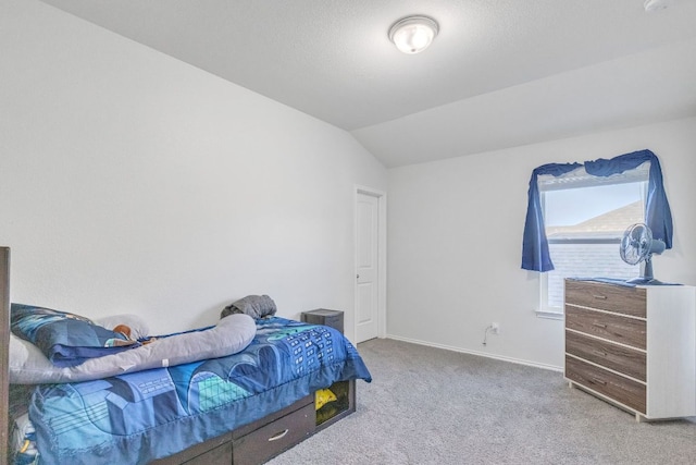 1062 Bowline Dr, Georgetown, TX 78633 - carpeted bedroom with vaulted ceiling and baseboards