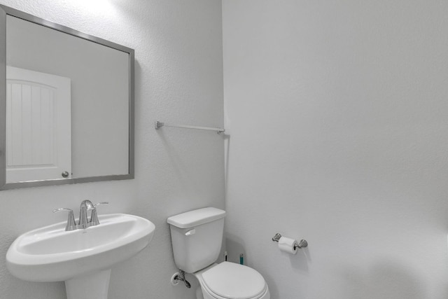 1062 Bowline Dr, Georgetown, TX 78633 - half bath featuring a sink and toilet