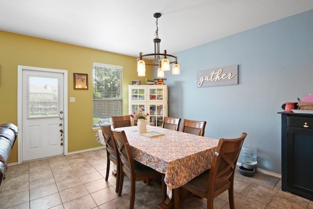 108 Marcheeta Way, Leander, TX 78641 - dining room featuring light tile patterned floors and a chandelier