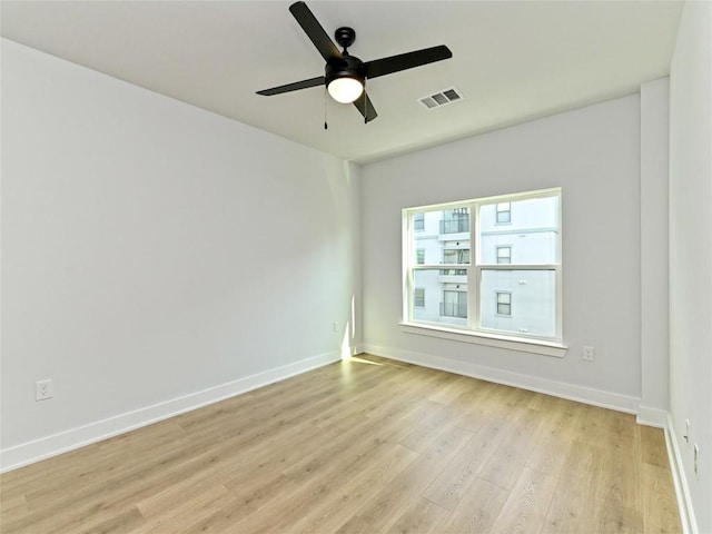 2500 Longview St Unit 518, Austin, TX 78705 - empty room with light wood-type flooring, a ceiling fan, and baseboards