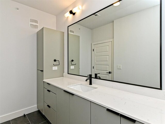 2500 Longview St Unit 518, Austin, TX 78705 - bathroom with vanity, tile patterned floors, and baseboards