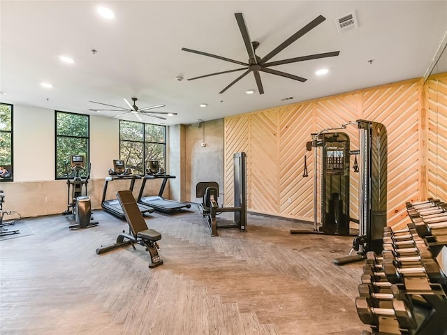 2500 Longview St Unit 518, Austin, TX 78705 - gym with ceiling fan, recessed lighting, and wooden walls