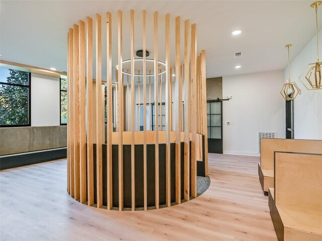 2500 Longview St Unit 518, Austin, TX 78705 - hallway featuring wood finished floors, recessed lighting, and baseboards