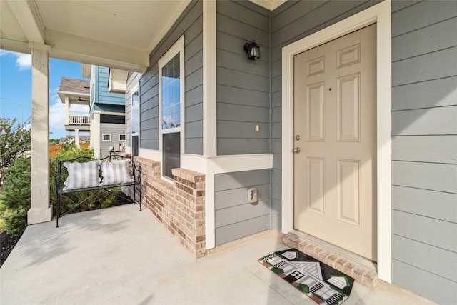 310 Spiny Lizard Ln, San Marcos, TX 78666 - doorway to property with a porch and brick siding