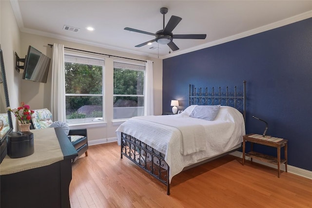 6305 Carrington Dr, Austin, TX 78749 - bedroom featuring light wood-type flooring, baseboards, ornamental molding, ceiling fan, and recessed lighting