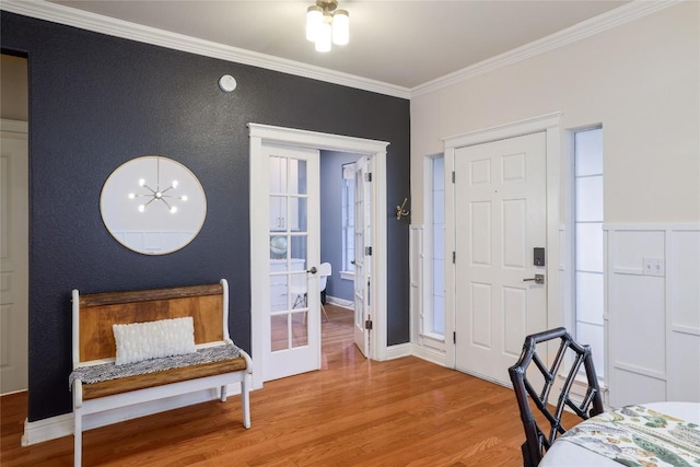 6305 Carrington Dr, Austin, TX 78749 - entrance foyer with wood finished floors, ornamental molding, and french doors