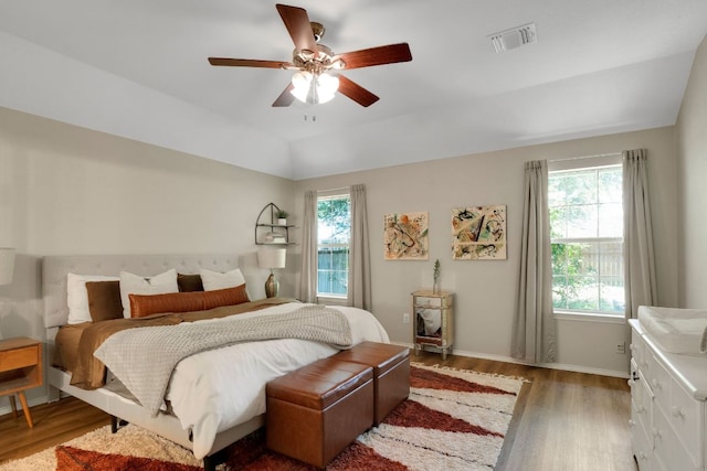 606 Indian Run Dr, Pflugerville, TX 78660 - bedroom featuring wood finished floors and ceiling fan