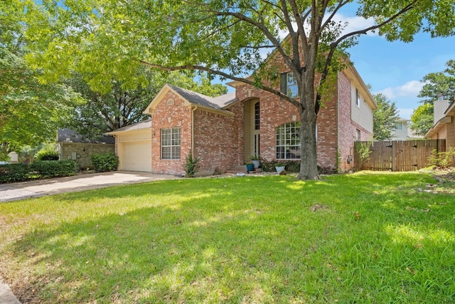 606 Indian Run Dr, Pflugerville, TX 78660 - traditional home featuring brick siding, an attached garage, and driveway