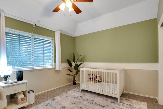 606 Indian Run Dr, Pflugerville, TX 78660 - carpeted bedroom featuring a nursery area, a desk, ceiling fan, and vaulted ceiling
