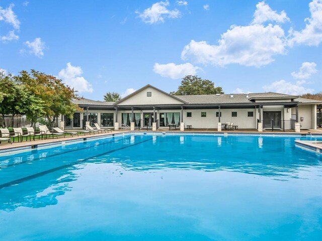 606 Indian Run Dr, Pflugerville, TX 78660 - community pool with a patio