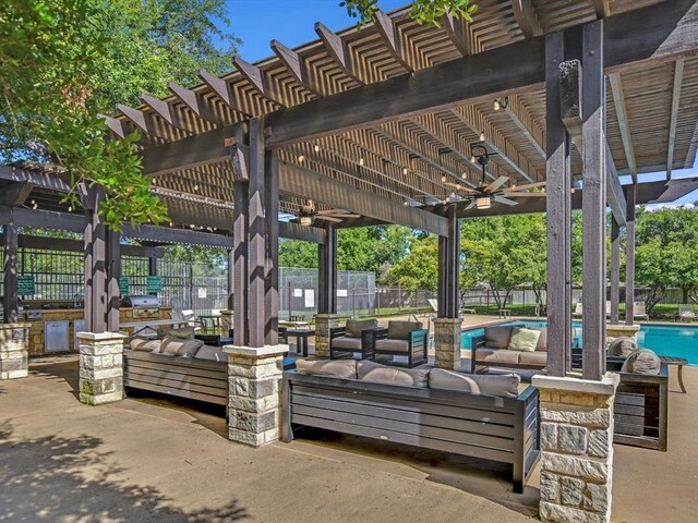 606 Indian Run Dr, Pflugerville, TX 78660 - fenced backyard featuring ceiling fan, a pergola, area for grilling, and an outdoor living space