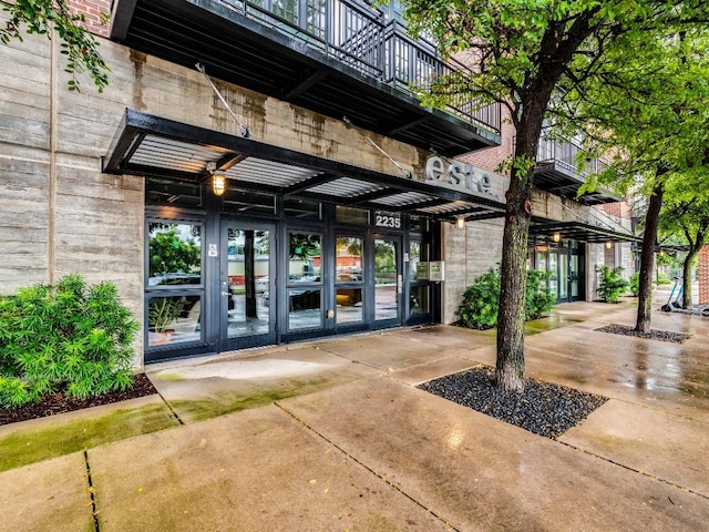 2235 E 6th St Unit 302, Austin, TX 78702 - entrance to property featuring a balcony and french doors