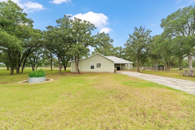 3434 Prairie Lea Rd, Kingsbury, TX 78638 - view of yard featuring driveway and an attached carport
