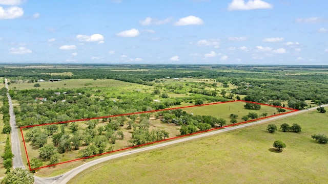 3434 Prairie Lea Rd, Kingsbury, TX 78638 - aerial view of sparsely populated area featuring property parcel outlined and a heavily wooded area