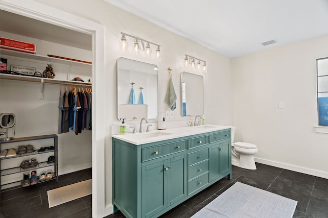 3434 Prairie Lea Rd, Kingsbury, TX 78638 - full bath with double vanity, a spacious closet, and tile patterned floors
