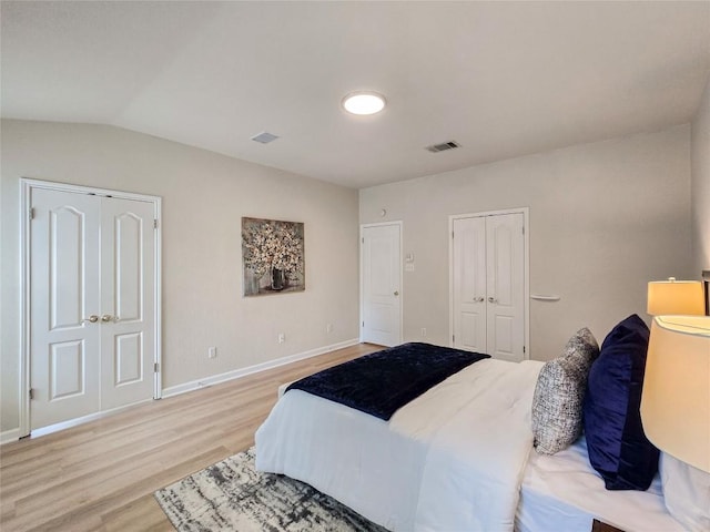 9403 Tea Rose Trl, Austin, TX 78748 - bedroom featuring light wood-type flooring, baseboards, and lofted ceiling