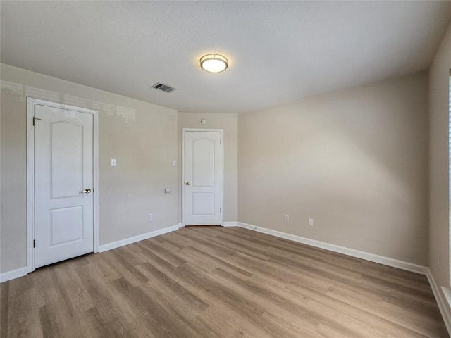 9403 Tea Rose Trl, Austin, TX 78748 - empty room with light wood-style flooring and baseboards