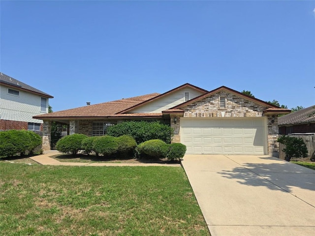 9403 Tea Rose Trl, Austin, TX 78748 - ranch-style home with a garage, driveway, a front lawn, and stone siding