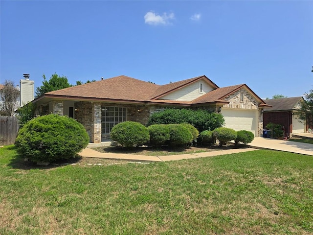 9403 Tea Rose Trl, Austin, TX 78748 - ranch-style house with a garage, driveway, brick siding, and a chimney