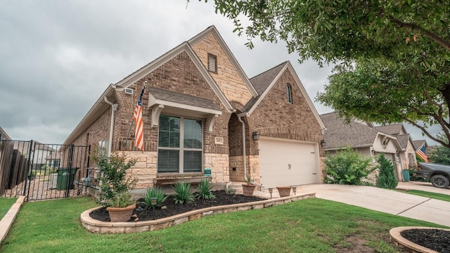 108 Berkeley Pl, Georgetown, TX 78628 - view of front of home featuring brick siding, stone siding, driveway, and an attached garage