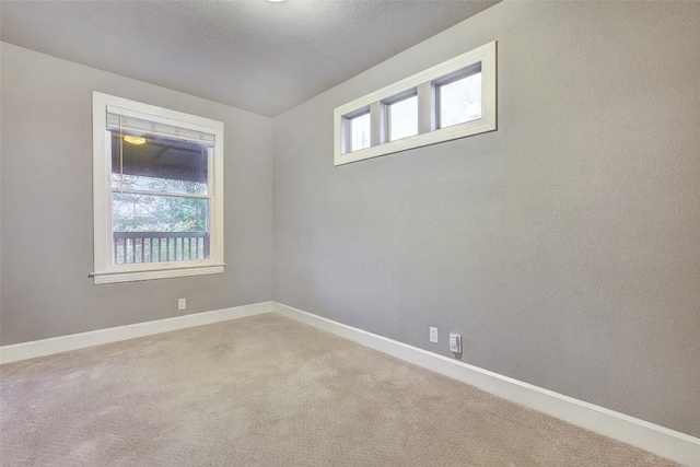 1309 E 13th St, Austin, TX 78702 - empty room featuring carpet flooring and baseboards