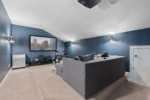 7609 Lazy River Cv, Austin, TX 78730 - home theater room with carpet flooring, vaulted ceiling, a textured wall, and baseboards
