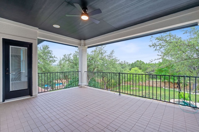 7609 Lazy River Cv, Austin, TX 78730 - view of patio / terrace featuring a ceiling fan and a balcony