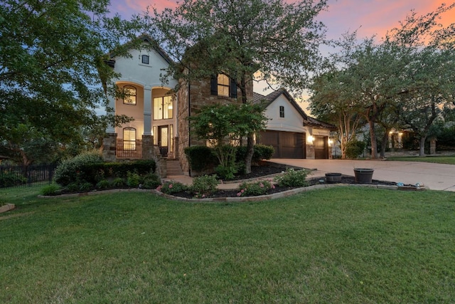 7609 Lazy River Cv, Austin, TX 78730 - mediterranean / spanish-style house with concrete driveway, an attached garage, and stucco siding