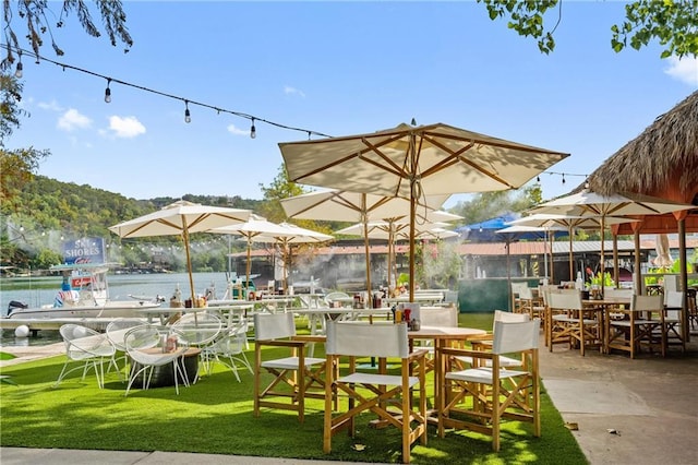 7609 Lazy River Cv, Austin, TX 78730 - view of patio / terrace featuring a water view