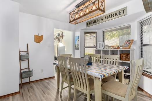 2305 Canyon Creek Dr, Temple, TX 76502 - dining space with wood finished floors and baseboards