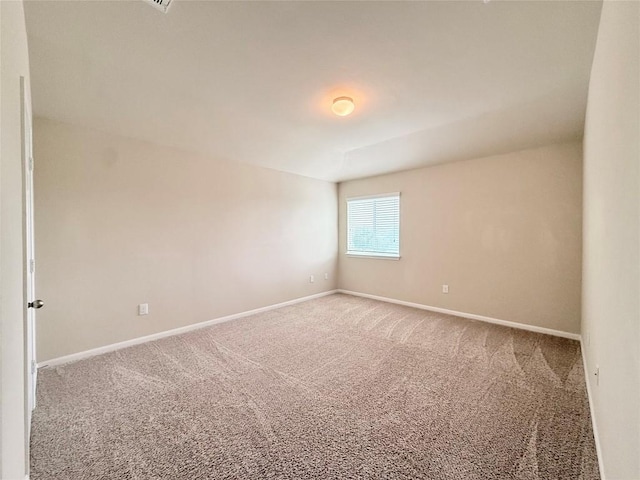 110 Carbine Ct, Bastrop, TX 78602 - carpeted empty room with baseboards