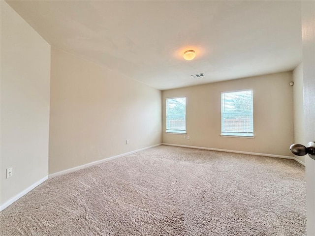 110 Carbine Ct, Bastrop, TX 78602 - spare room with carpet floors and baseboards