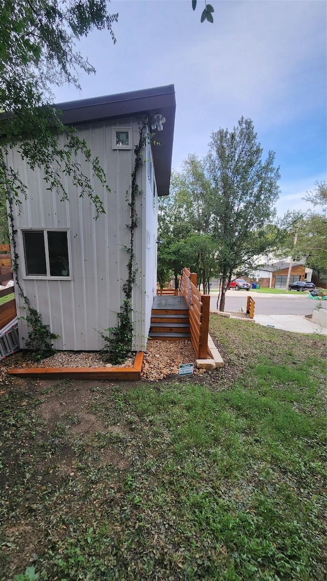 1134 Lott Ave, Austin, TX 78721 - view of side of property with board and batten siding