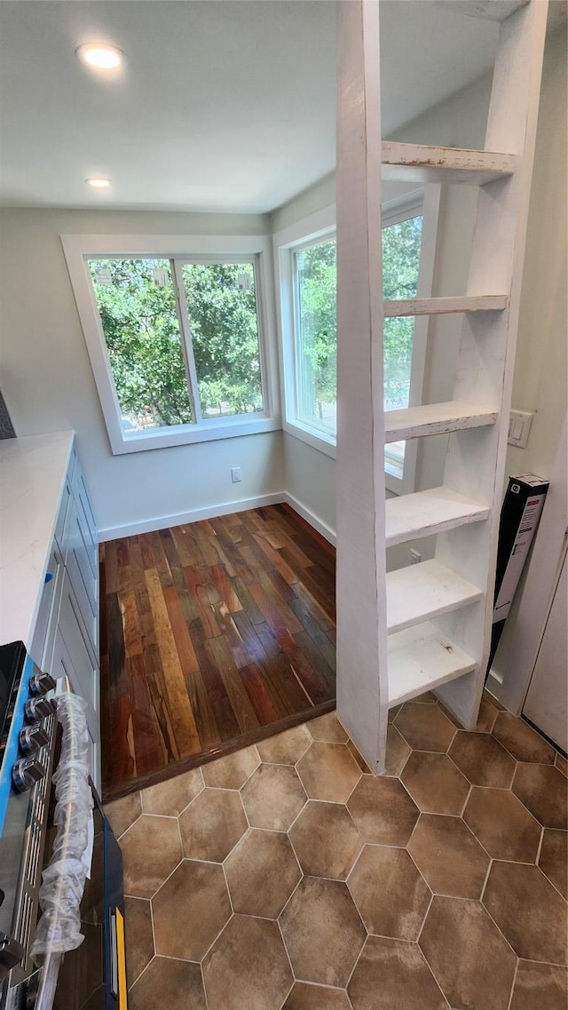 1134 Lott Ave, Austin, TX 78721 - unfurnished dining area with plenty of natural light, recessed lighting, and baseboards