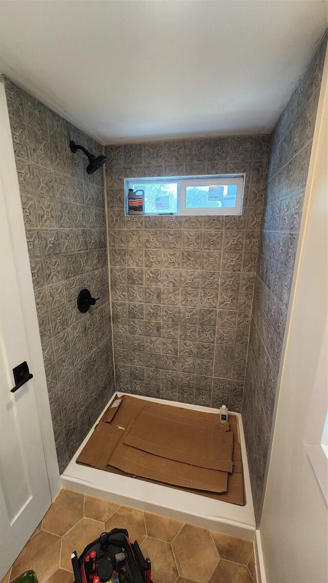 1134 Lott Ave, Austin, TX 78721 - bathroom featuring a stall shower and tile patterned floors