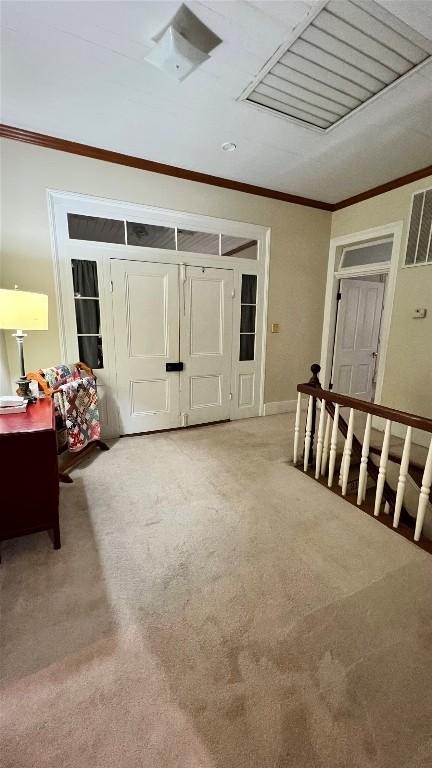 636 Franklin St S, La Grange, TX 78945 - unfurnished room featuring light carpet, ornamental molding, and baseboards