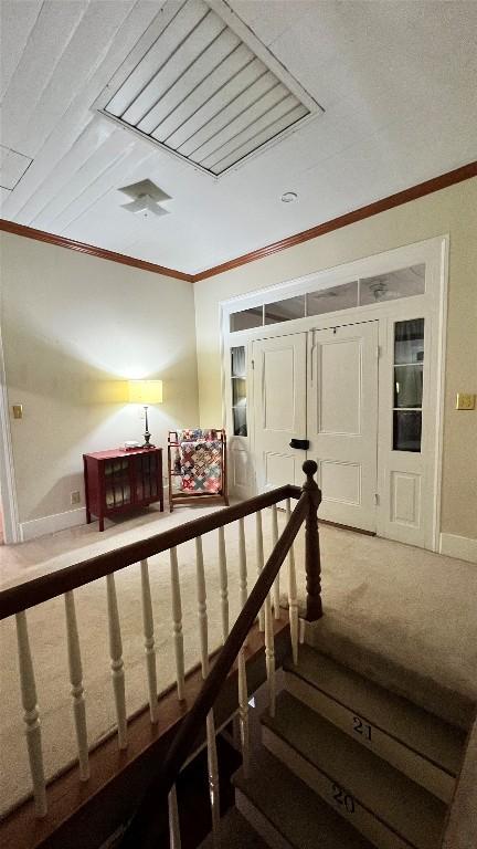 636 Franklin St S, La Grange, TX 78945 - stairway with carpet flooring, crown molding, and baseboards