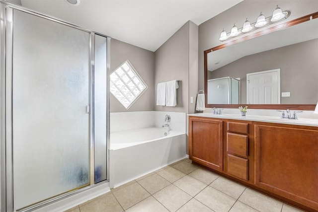 1103 Sugar Brook Dr, Temple, TX 76502 - bathroom with a stall shower, a garden tub, double vanity, tile patterned flooring, and vaulted ceiling