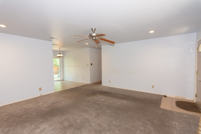 6903 N La Salle Dr, Austin, TX 78723 - unfurnished living room with a ceiling fan, carpet floors, and recessed lighting