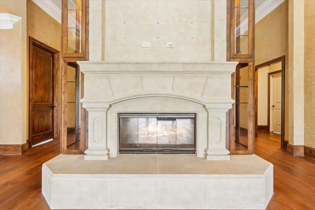 1111 Mill Creek Dr, Salado, TX 76571 - detailed view of wood finished floors and a glass covered fireplace