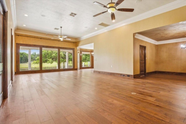 1111 Mill Creek Dr, Salado, TX 76571 - unfurnished living room with a ceiling fan, hardwood / wood-style floors, crown molding, and recessed lighting